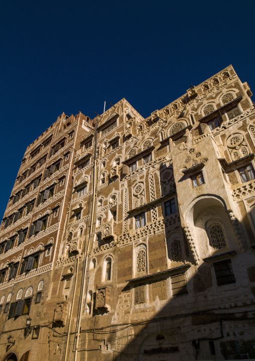 Traditional houses in the old city featuring ornamental facades, Amanat Al-Asemah, Sanaa, Yemen