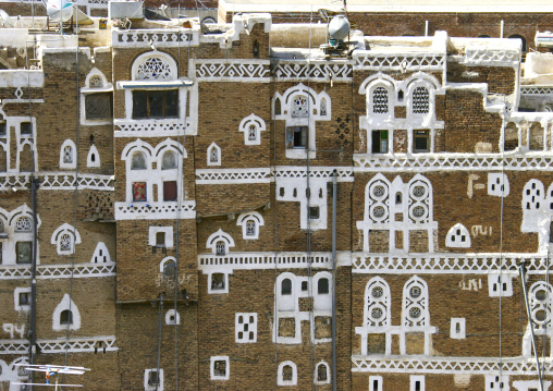 Traditional house in the old city featuring stained-glass windows, Amanat Al-Asemah, Sanaa, Yemen