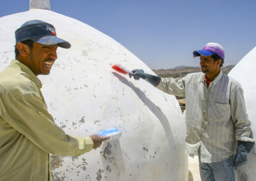 Yemeni workers cleaning Al-Amiriya mosque, Al Bayda Governorate, Rada, Yemen