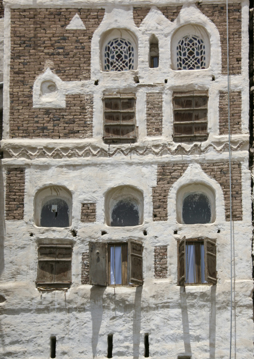 Traditional house in the old city featuring stained-glass windows, Amanat Al-Asemah, Sanaa, Yemen