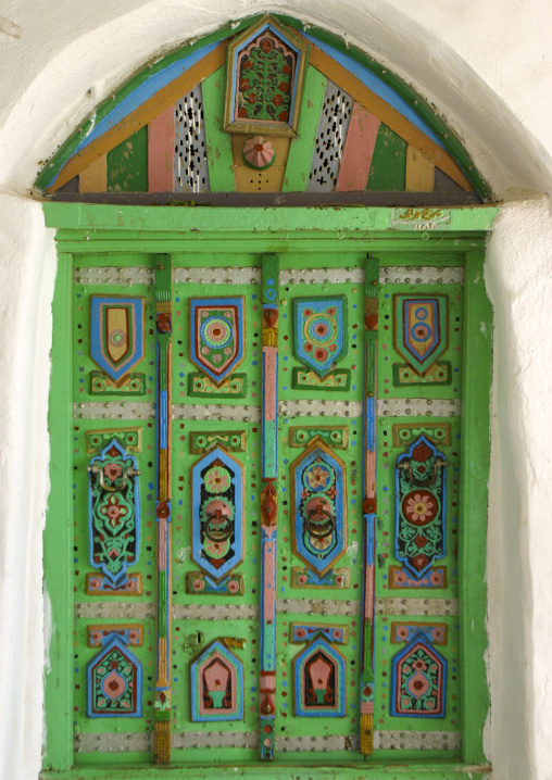 Heritage house green door in the old town, Taiz Governorate, Yafrus, Yemen