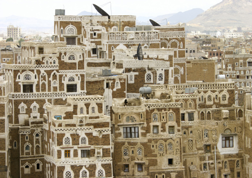 Traditional houses in the old city featuring ornamental facades, Amanat Al-Asemah, Sanaa, Yemen