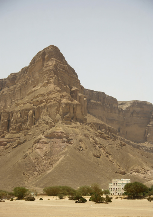 Traditional house in front of a mountain, Wadi doan, Khaila, Yemen