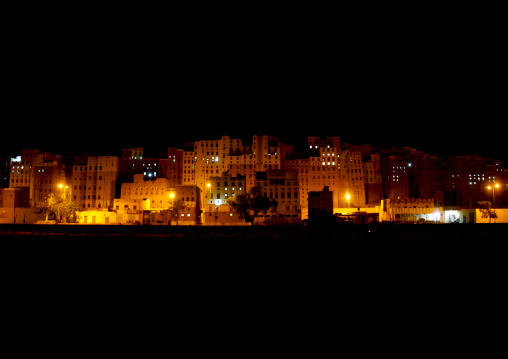 Multi- storey buildings made from mud at night, Hadhramaut, Shibam, Yemen