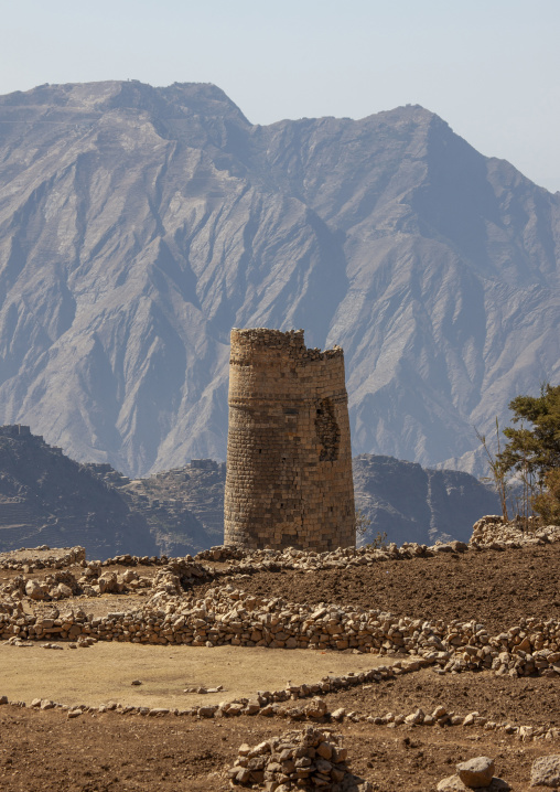 Stone watchtower against mountain, Amran Governorate, Hababah, Yemen