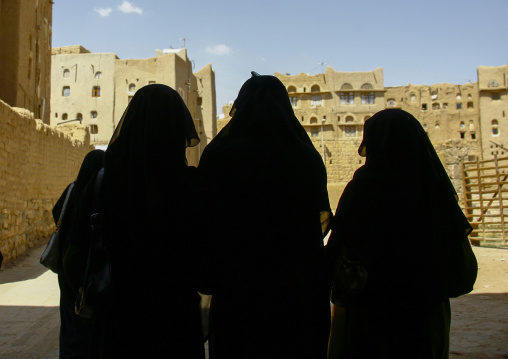 Veiled muslim women in the street, Amran Governorate, Amran, Yemen