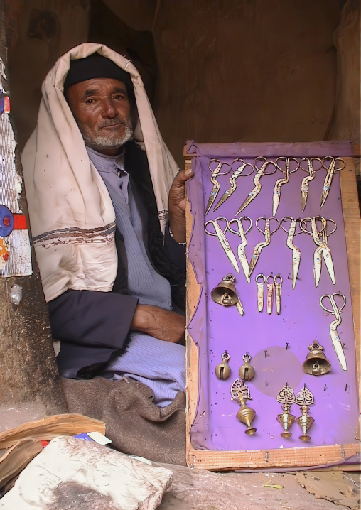Portrait of a yemeni man selling scissors, Al Hudaydah Governorate, Hodeidah, Yemen