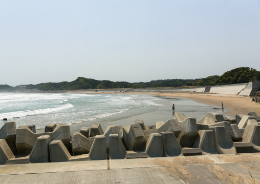 Japanese surfers in the contaminated area after the daiichi nuclear power plant irradiation, Fukushima prefecture, Tairatoyoma beach, Japan
