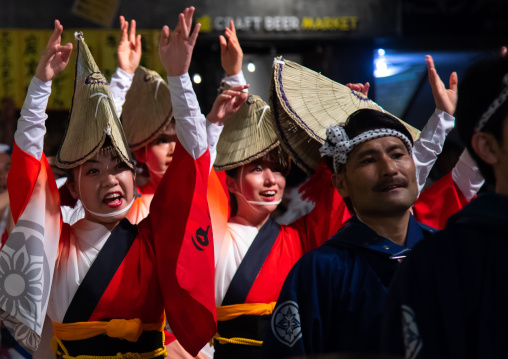 Japanese women with straw hats during the Koenji Awaodori dance summer street festival, Kanto region, Tokyo, Japan