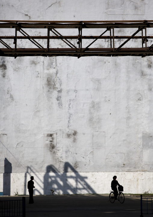 North Korean people riding bicycles in Hungnam nitrogen fertilizer plant, South Hamgyong Province, Hamhung, North Korea