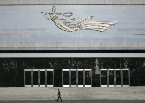 North Korean man passing in front of Mangyongdae children's palace
, Pyongan Province, Pyongyang, North Korea