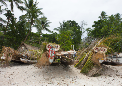 Traditional canoe with carved and painted decorations, Milne Bay Province, Trobriand Island, Papua New Guinea